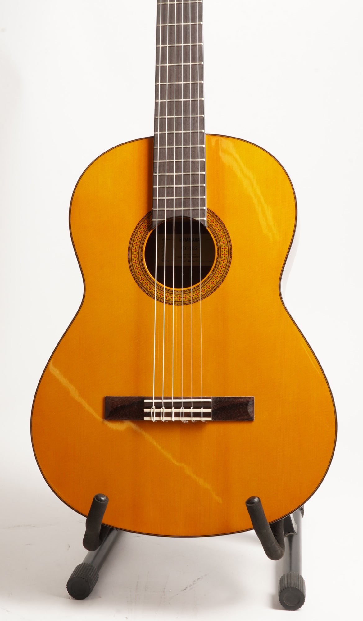 Yamaha CG102 6 String Right Handed Gloss Classical Guitar with Spruce Top (Used)