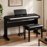 Yamaha DGX670 88-Key Portable Grand Piano Bundle with Stand, Bench, and Pedal (Black)