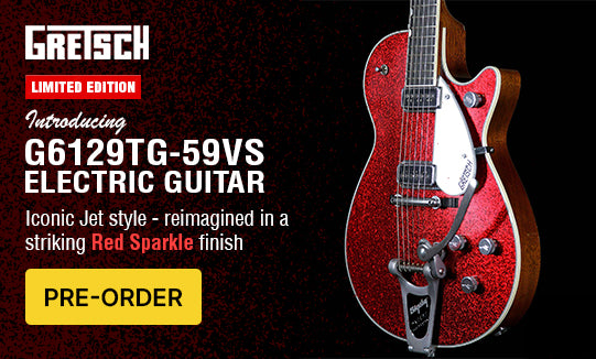 Gretsch G6129TG-59VS electric guitar with red sparkle finish on a dark background